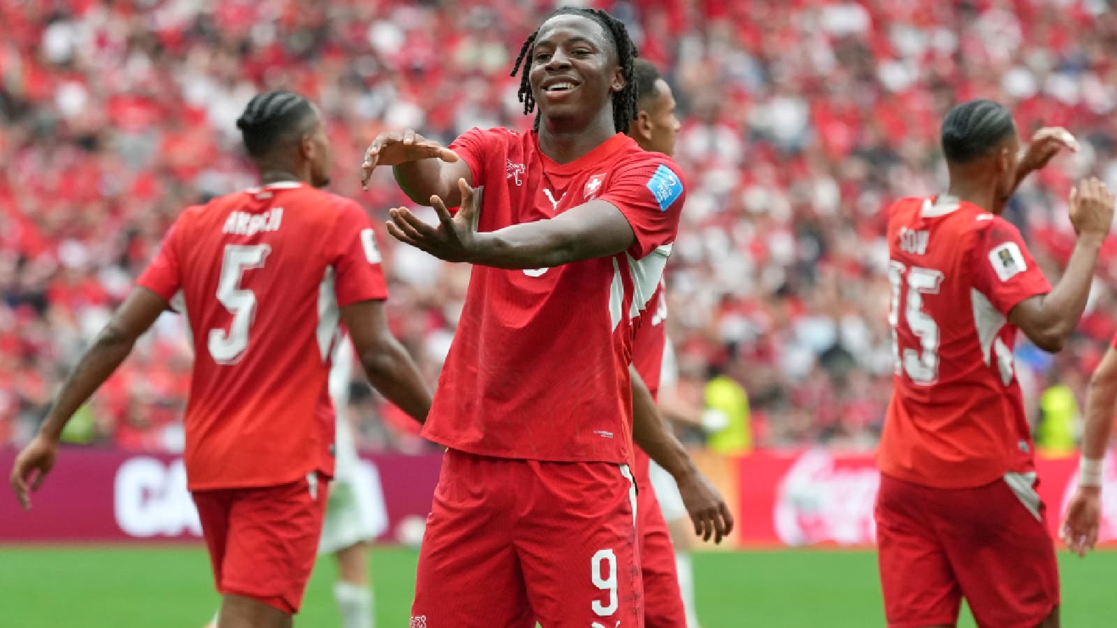 Its mango not manga, as Johan Manzambi celebrates 2-1 Swiss win over Canada