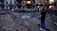 Rescuers pull dead from rubble of Kyiv flats after massive Russian strikes