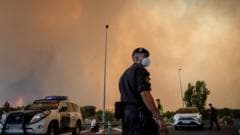 Firefighters struggle to contain Madrid wildfires, as more than 160,000 evacuated in France and Spain