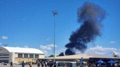 Fighter jet crews parachute safely after collision at US air show