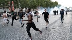 Hundreds arrested and dozens of police injured after Champions League riots in France