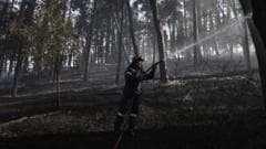 Firefighters struggle to contain deadly Greek wildfire