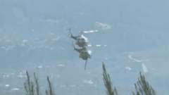 Two crew killed as British pilot survives after firefighting helicopters collide in Greece