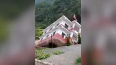 Watch: Moment a government building collapses into a river in Nepal amid floods