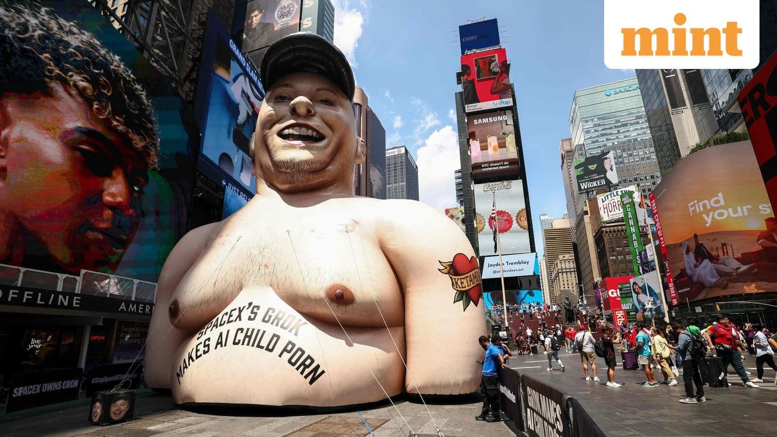 Giant inflatable Elon Musk pops up in Times Square before SpaceX IPO with a warning for investors