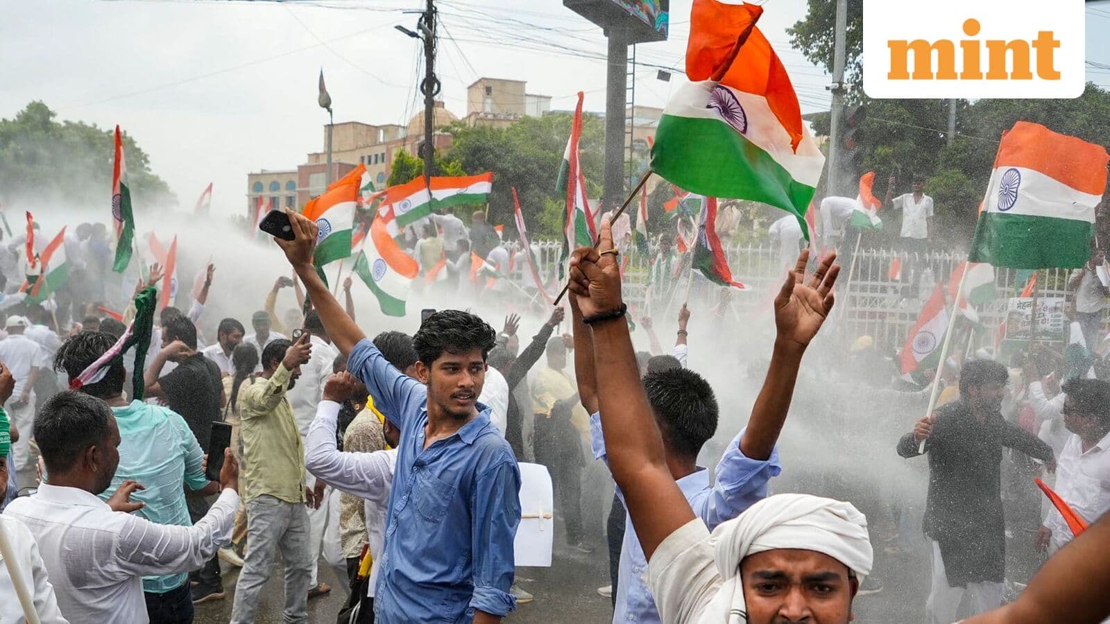 Bihar Police use water cannon at RJD march towards Lok Bhavan in Patna over paper leaks, unemployment | Watch